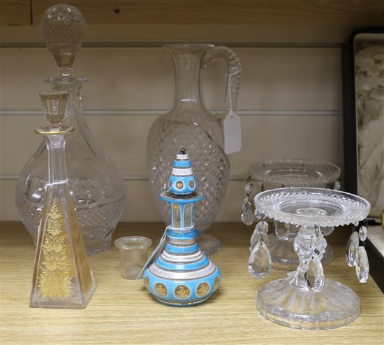 A pair of cut glass tazzas hung with lustres, a decanter and stopper, a claret jug and two scent bottles and stoppers (6)